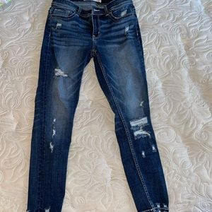 Ripped dark blue light wash jeans